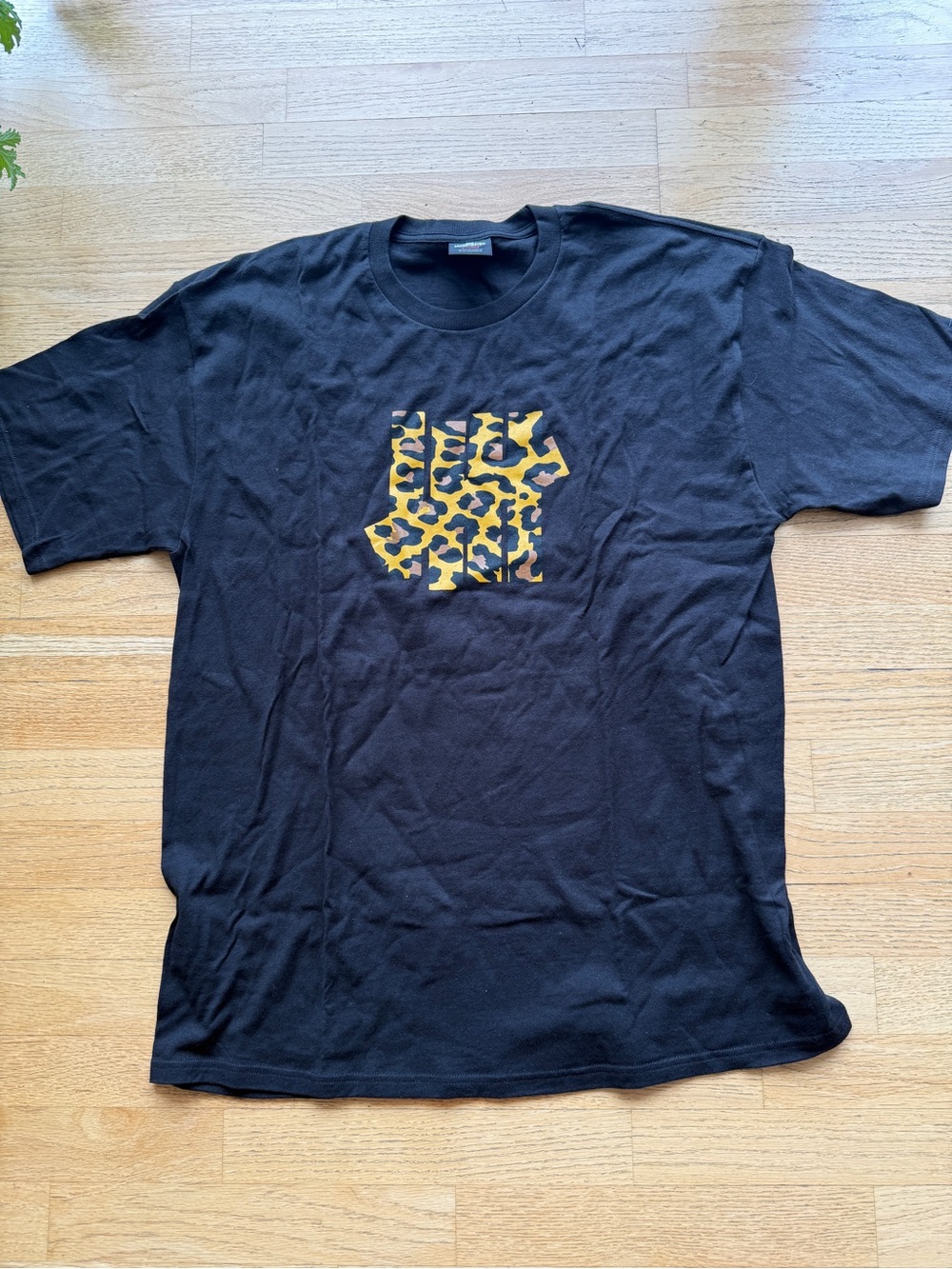 Undefeated Black Tee with Yellow Leopard Box Logo